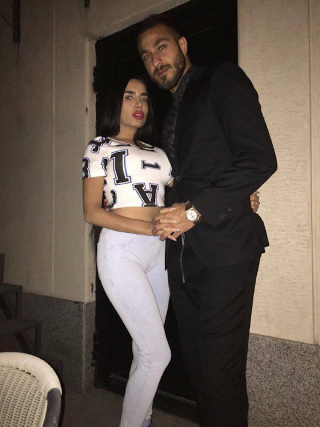 Illustration for article titled Iranian Goalkeeper Arrested For Posting "Indecent" Photos Of Himself With Women